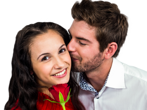 Smiling couple holding rose