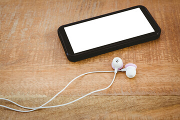 Black smartphone with white headphones