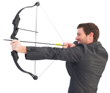 Handsome businessman shooting a bow and arrow