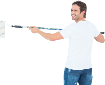 Happy man using paint roller