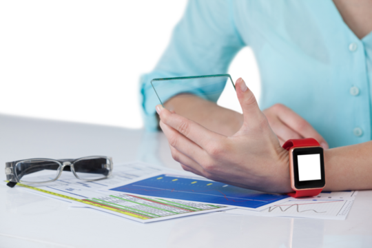 Businesswoman pretending to hold mobile phone