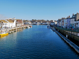 Boats in the old town of Weymouth Harbour and Weymouth Marina in Dorset, England, UK