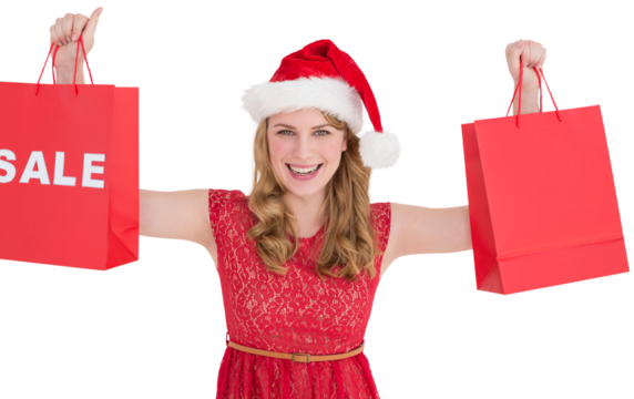 Festive blonde holding sale shopping bags - Powered by Adobe