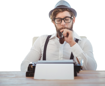 Hipster smoking pipe while sitting looking at typewriter