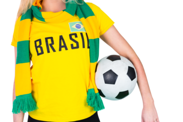 Football fan in brasil tshirt holding ball