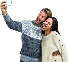 Couple making face while taking selfie