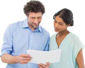 Businessman with female colleague reading documents