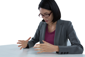 Businesswoman pretending to hold invisible object