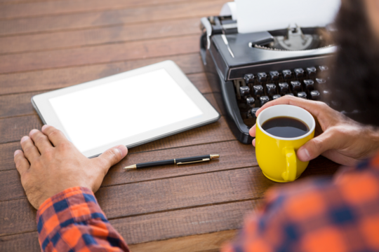 A man is drinking coffee