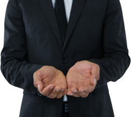 Obraz premium Midsection of businessman with hands cupped standing over white background