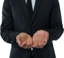 Midsection of businessman with hands cupped standing over white background