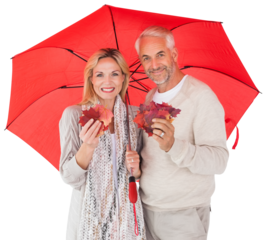 Portrait of happy couple under red umbrella