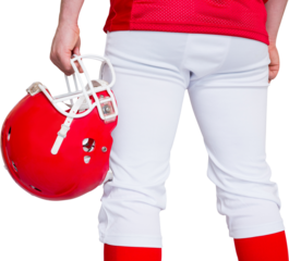 American football player holding a helmet
