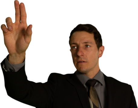 Man touching invisible screen