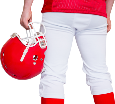American football player holding a helmet