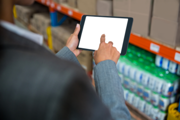 Businesswoman touching screen of digital tablet