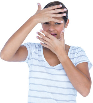 Close-up of upset woman covering face with hands