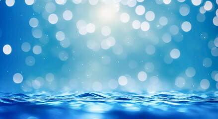 Bright water surface with blue bokeh and glitter effects. © PongSS