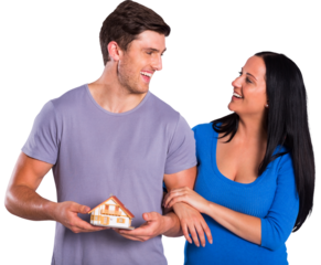 Young couple holding a model house