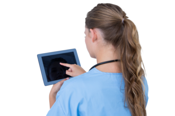 Serious nurse using tablet pc 