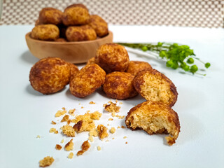 Cheese palm ball cookies, made from flour and cheese, then coated with sweet crunchy palm sugar. Popular serving to celebrate Eid Al Fitr (Lebaran Idul Fitri). Selected focus
