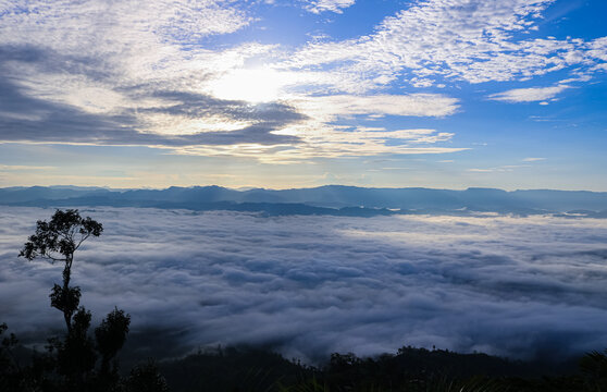 Beautiful Sunrise in Mountains above Clouds