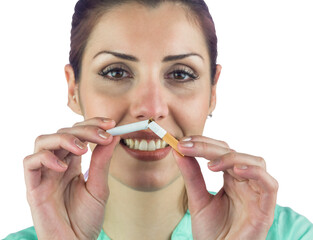Close-up portrait of smiling woman holding cigarette 