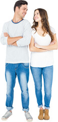 Fototapeta premium Happy couple standing with arms crossed