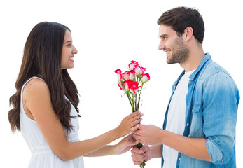 Happy hipster giving his girlfriend roses