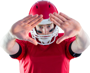 Portrait of american football player protecting himself 