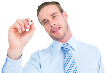 Smiling businessman in shirt writing with marker