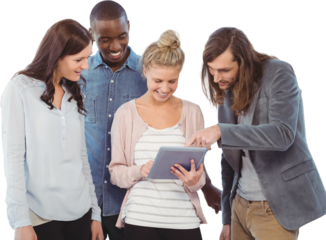 Happy woman holding digital tablet and discussing with coworkers 