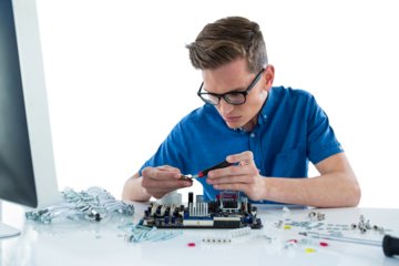 Computer technician repairing motherboard