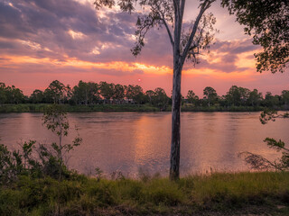 Sunset Over the River with Reflections