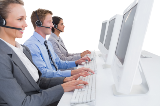 Business team working on computers and wearing headsets - Powered by Adobe
