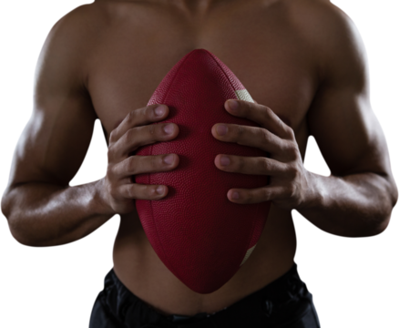 Mid section of muscular American football player with ball - Powered by Adobe