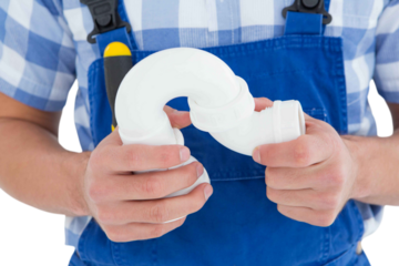 Plumber holding sink pipe on white background