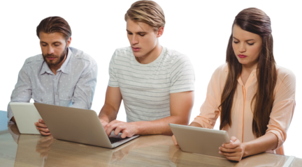 Focused business people using technology against white background