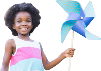 Portrait of of happy boy holding pinwheel 