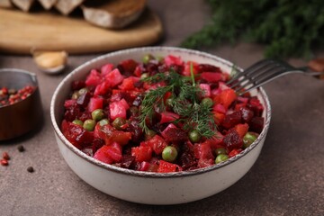 Delicious vinaigrette salad on grey table, closeup