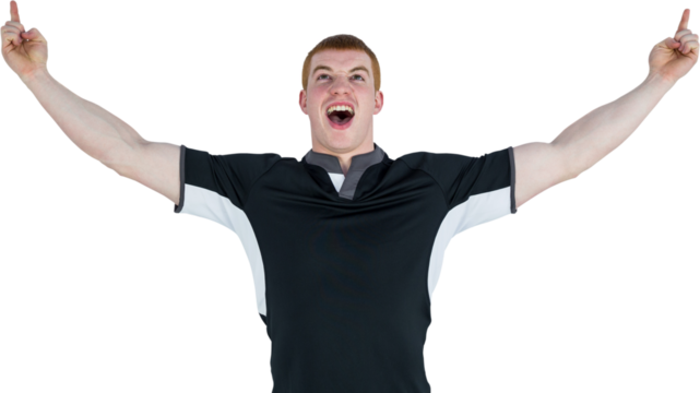 A rugby player gesturing victory