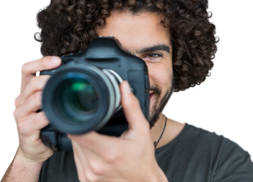 Close up portrait of male photographer taking picture 