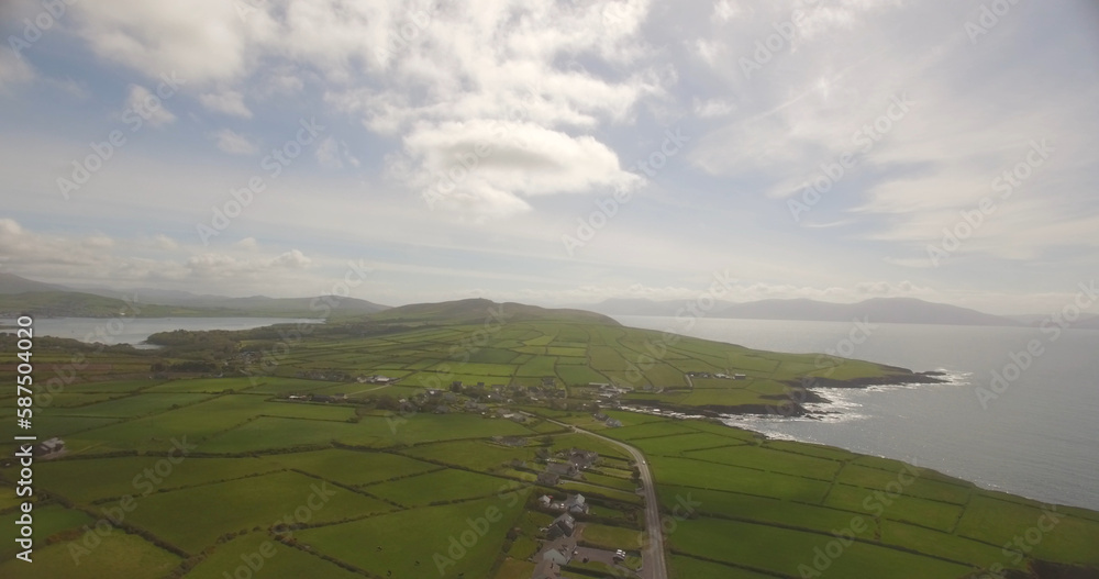 Canvas Prints View of farm landscape by sea against sky