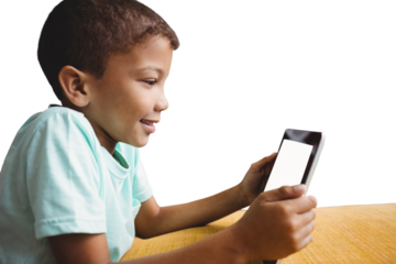 Boy looking at digital tablet at table
