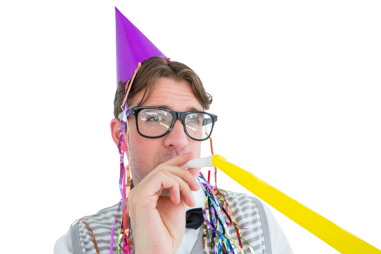 Geeky hipster wearing a party hat with blowing party horn