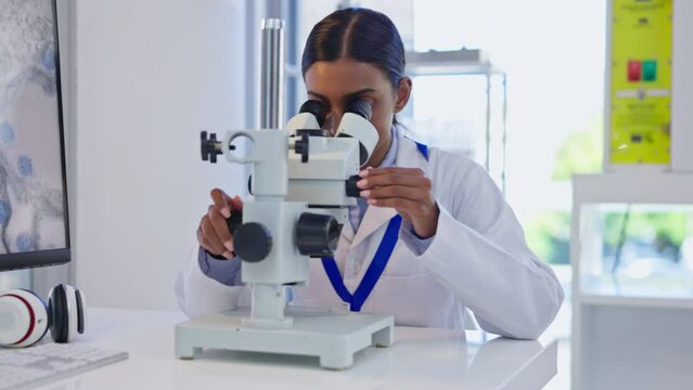 Medical, microscope check and woman science researcher for dna research and laboratory work for study. Lab worker, analytics and biotechnology analysis of a clinic employee working on health results