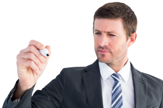 Serious businessman writing with marker