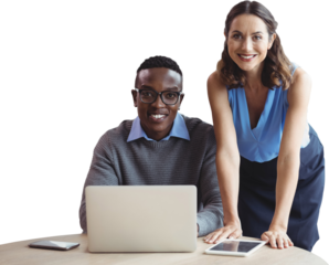 Portrait of smiling businesspeople with laptop at desk