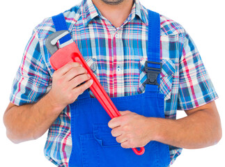 Fototapeta premium Cropped image of repairman holding monkey wrench