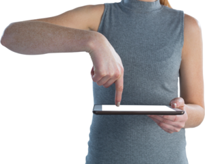 Mid section of businesswoman using digital tablet
